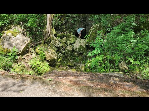 Massive River Cave On The Side Of The Road