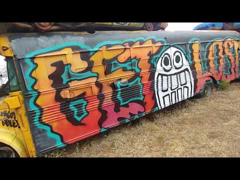 Schoolbus Graveyard Full Of Colorful Murals