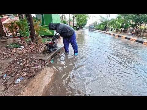 Remove debris and plastic that clogs drains after heavy rain