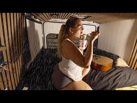 HEAVY RAIN CAMPING IN A BIG CAMPER VAN AT A GAS STATION