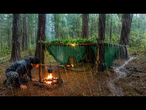 Rain Camping Building a Cozy Shelter Between Three Trees