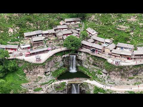 山西深山竟藏着一座400多年的悬空村，瀑布从村中央飞流而下，美得像世外桃源