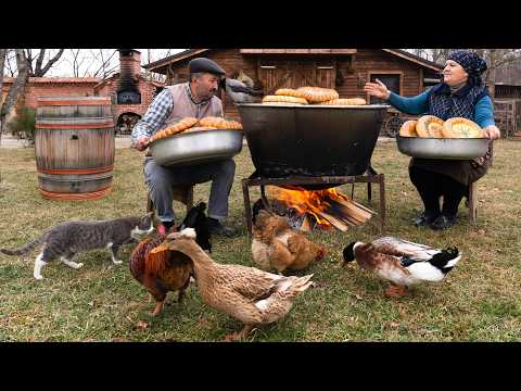 Traditional Winter Baking Uzbek Bread in a Viking Kazan