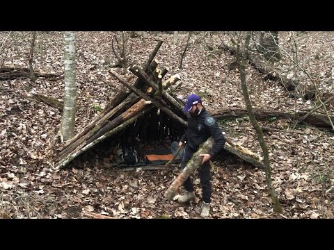 bushcraft winter camping in forest- survival skills: