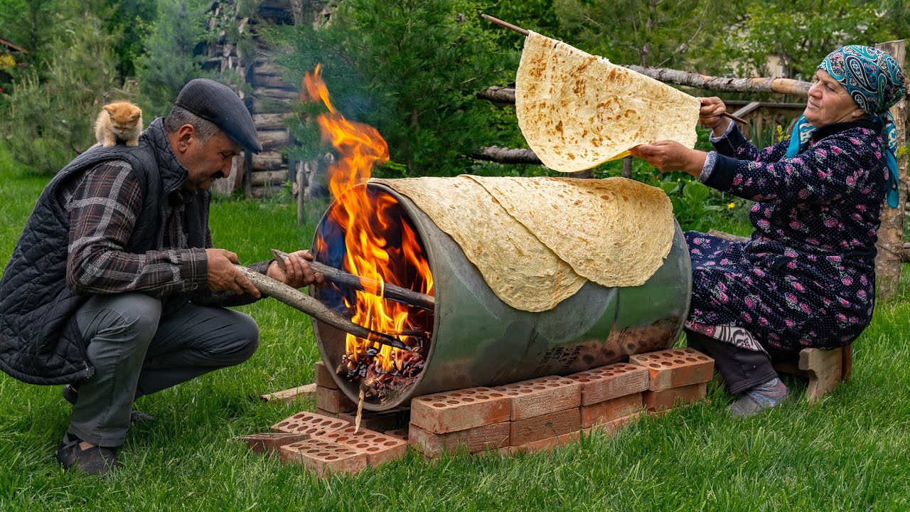 Traditional Lavash Bread: Baking Bread on a Barrel Over
