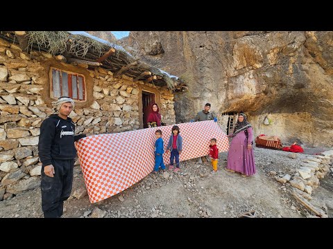 Sweet moments of the nomadic family Spreading the carpet
