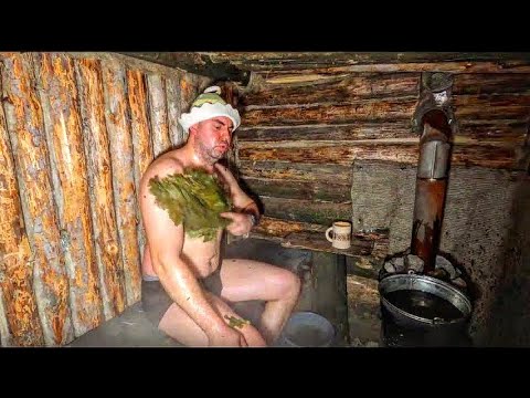 Tests of a forest sauna made of logs in the cold, Meat on