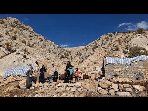 Iran nomadic life building a platform with natural stones