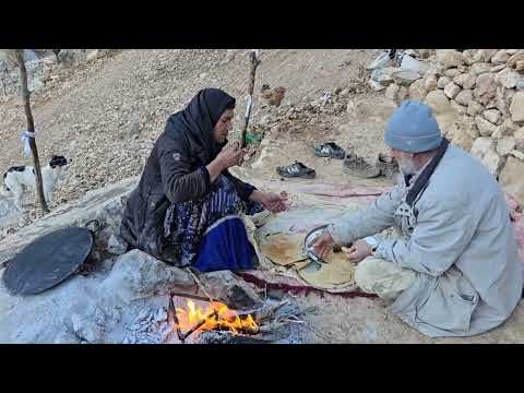 building the walls of the donkey shelter with stone and