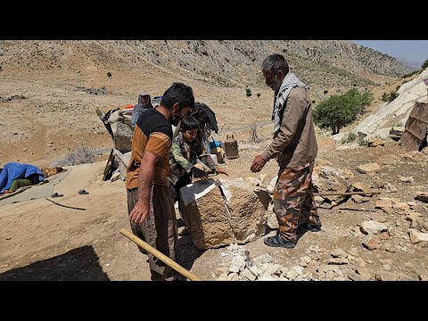 Iran nomadic life Crushing natural stones to prepare