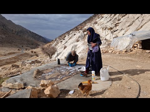 Iran nomadic life Cleaning dishes and clothes in the heart