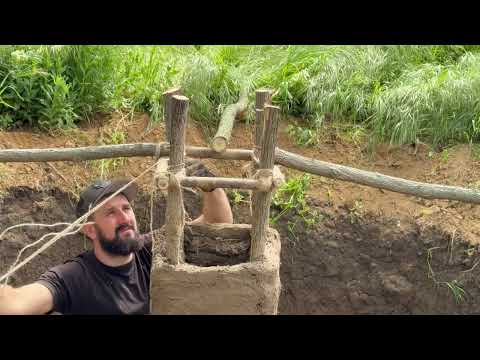 Building a round secret dugout with a large clay oven for