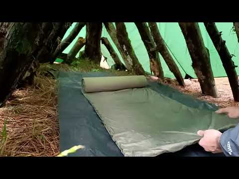 Camp in rainy weather under a tree Building a shelter under