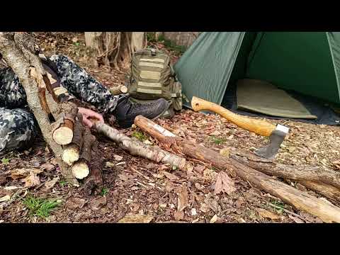 Building a shelter with a wooden wall Solo camping at night