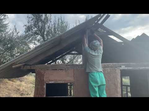 Man builds a house for survival on a deserted mountain