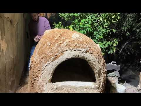 Build a giant clay oven and bake traditional bread