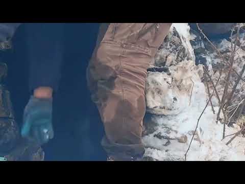 Survival on a Snow Covered Mountain Peak Building Stone