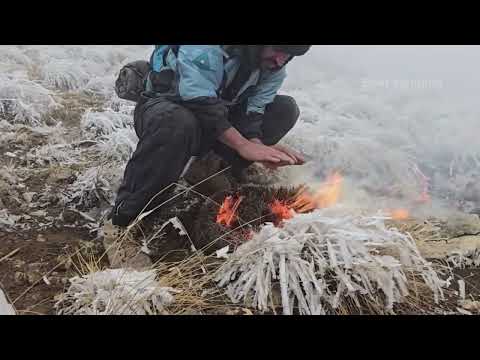 Trapped alone on a snow covered mountain Creating a shelter