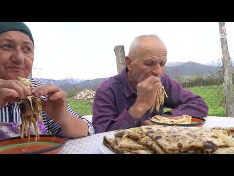 Sweet Grandma Baking Easter Bread in the Mountains of
