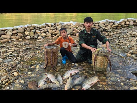 farm care Damming a large stream branch to catch fish for