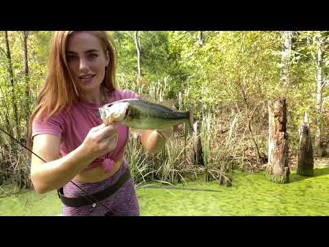 FISHING PARADISE POND CATCHING BASS ON A WOODEN RAFT