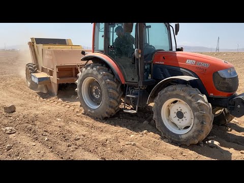 KORE TRAKTÖRÜ KİOTİ DX7510 TAŞ TOPLAMA