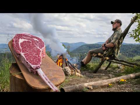 Stuffed Tomahawk Steak with Cheese Cooked in the Forest