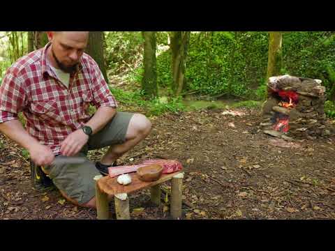 Primitive Tomahawk Steak in a Handmade Stone Oven Outdoor