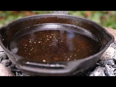 Cooking Ribeye Steaks on a Hot Axe Blade Deep in the Forest