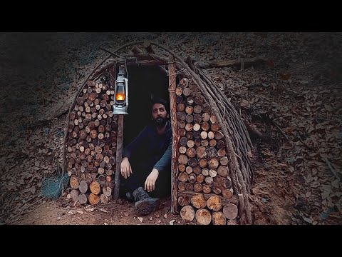 Building complete and warm survival shelter BUSHCRAFT