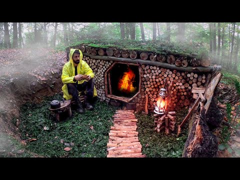 Bushcraft camp in the woods Moss roof shelter Build