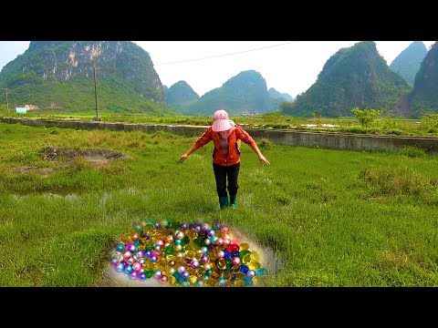 The small pond was filled with pearls and the woman