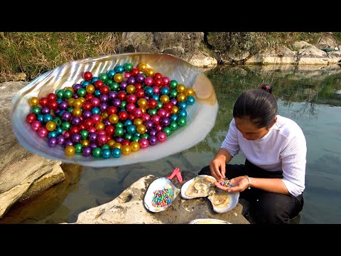 Beautiful women dive to catch pearl mussels which are