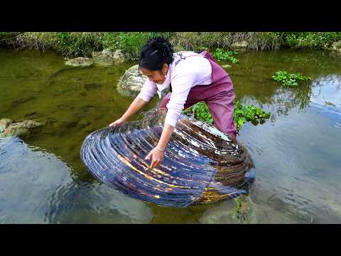 Found a wild river mussel with pearls that are very very