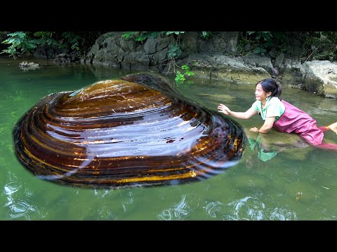 Gently touching the river clam you can hear the sound of