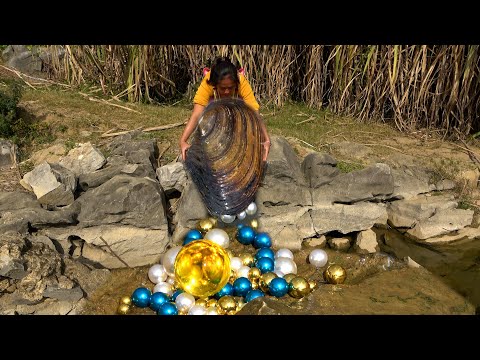 Pouring out a pile of pearls from the clam is really