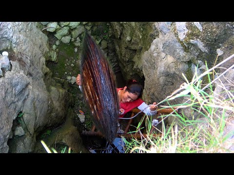 Using a ladder to descend the ancient well the exquisite