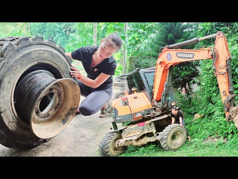 The genius girl in motorbike maintenance and tire change