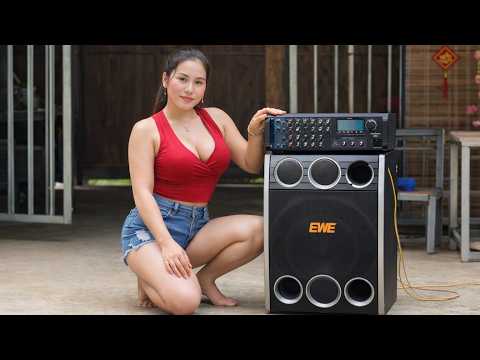 The girl repaired and restored an old amplifie and speakers