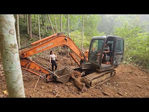 A new workday for the girl clearing a path and transporting
