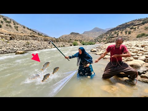 Tooba Alborz a brave couple who fish in the wild river for