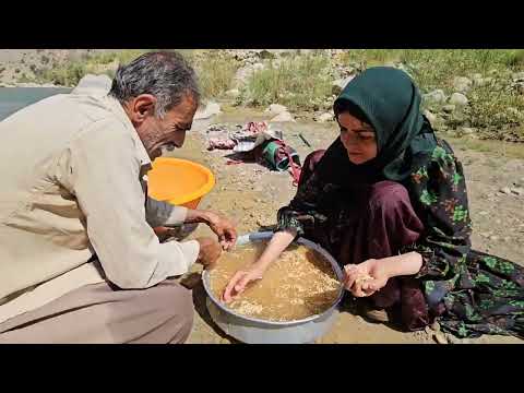 A nomadic couple went to the raging river for wild honey