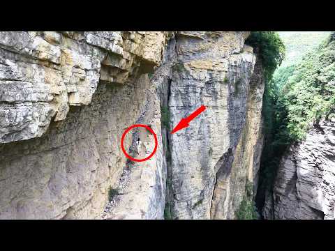 贵州深山竟发现一条挂在悬崖上的小路 200多米高没护栏 太吓人了 Guizhou s cliff plank road