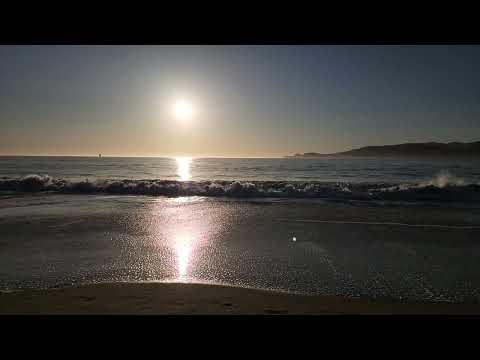 Sun setting San Francisco beach May 8 2024