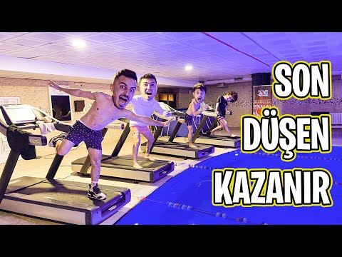 KOŞU BANDINDA HAVUZA DÜŞMEME YARIŞMASI