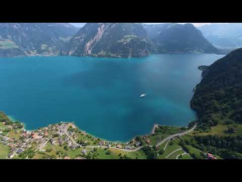 Wingsuit Flight Over a Stunning Lake