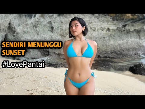MENUNGGU AIR SURUT DI PANTAI SAWANGAN