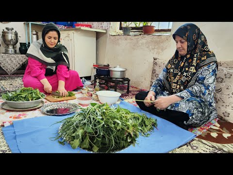 Cooking Gormeh sabzi with organic vegetables villagestyle