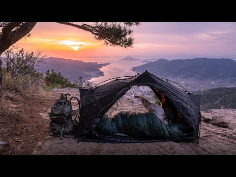 4K Camping on rocky cliff at the top of the mountain cozy