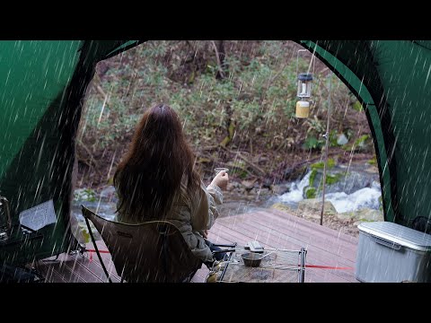 Camping in the rain In a rainy forest with no one I drink